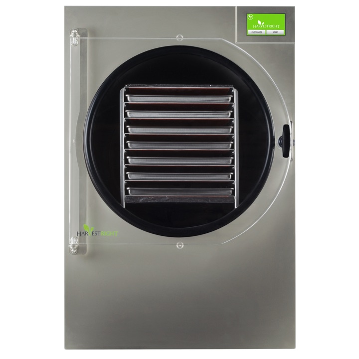 Front view of the stainless steel Harvest Right XL home freeze dryer with its tray rack visible